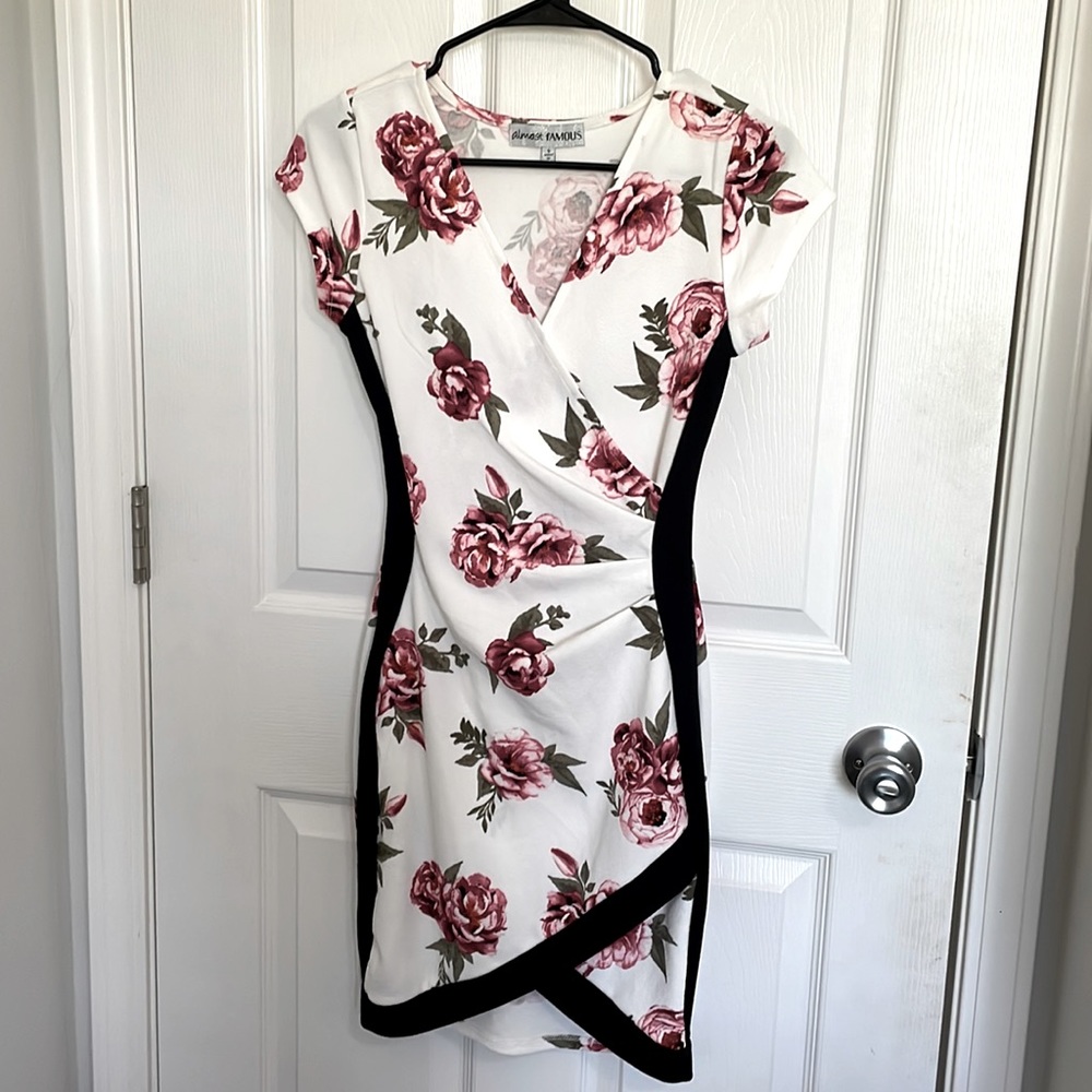 It’s an Almost Famous dress haven’t been wear and the quality is in good shape.